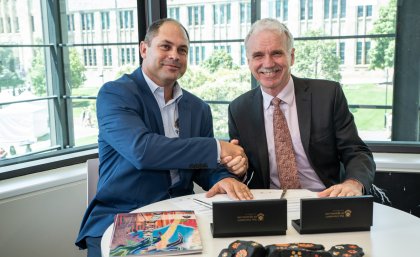 Quandamooka Yoolooburrabee Aboriginal Corporation CEO Cameron Costello and UQ Provost Professor Aidan Byrne.